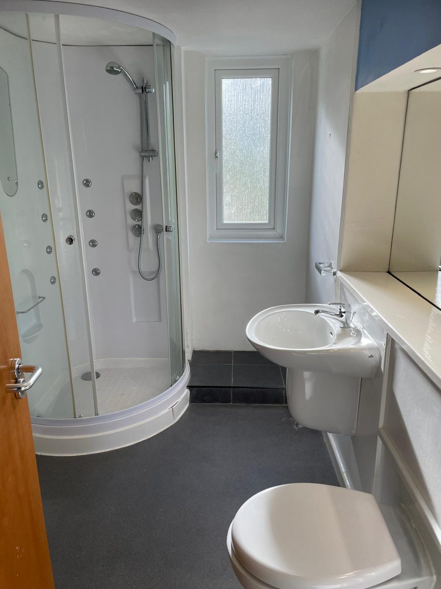 Bathroom before GPH Plumbing & Heating started