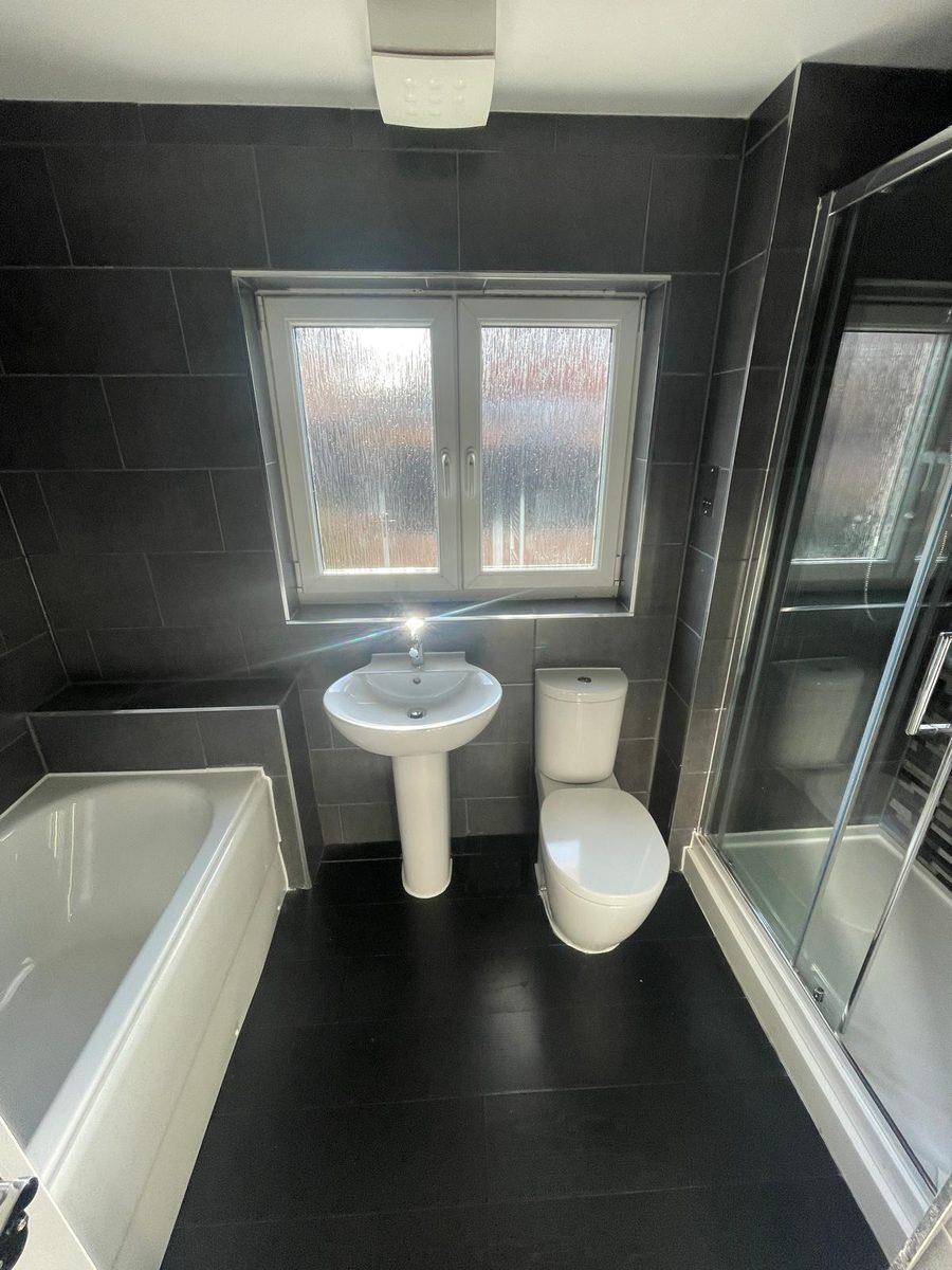 Bathroom before GPH Plumbing & Heating started