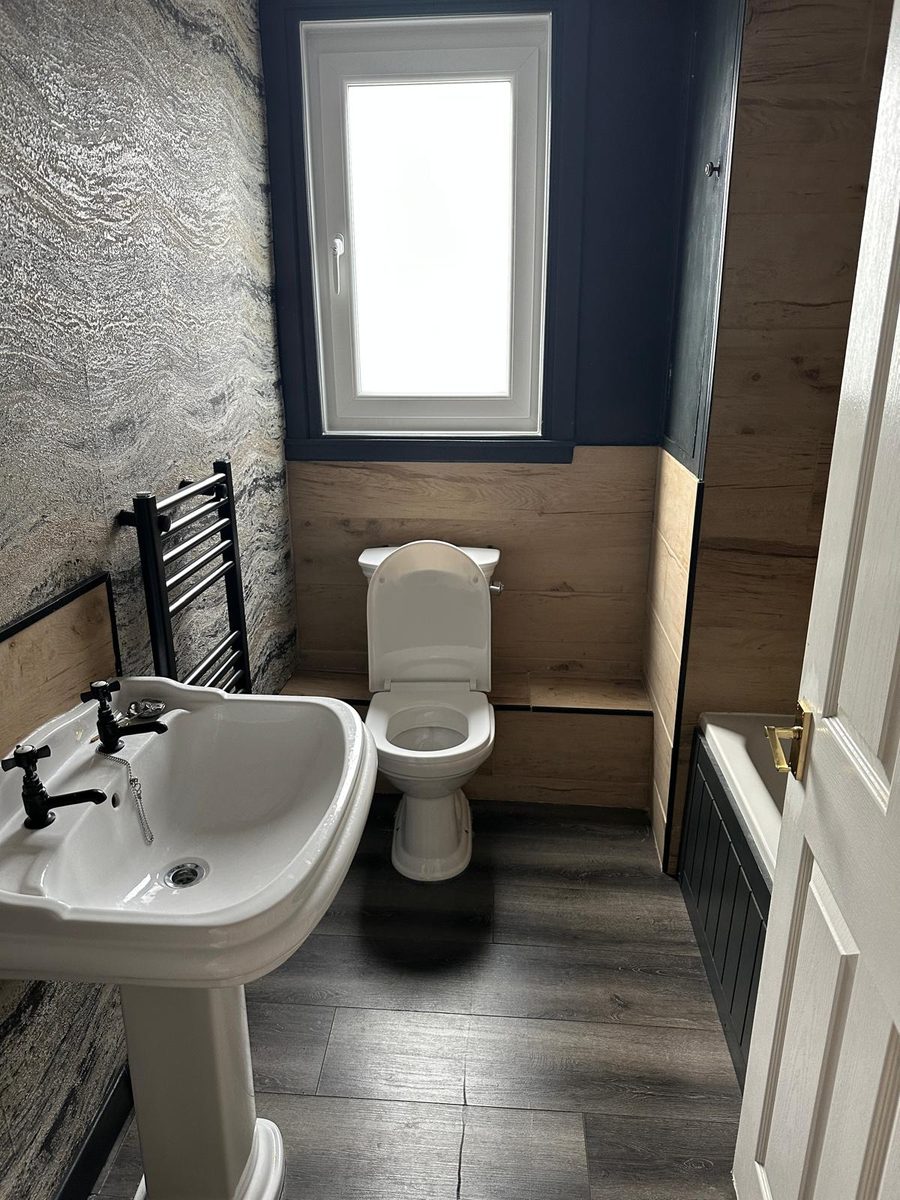 Bathroom before GPH Plumbing & Heating started
