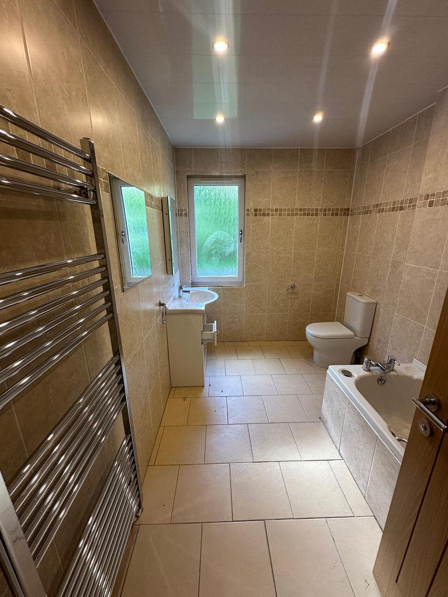 Bathroom before GPH Plumbing & Heating started