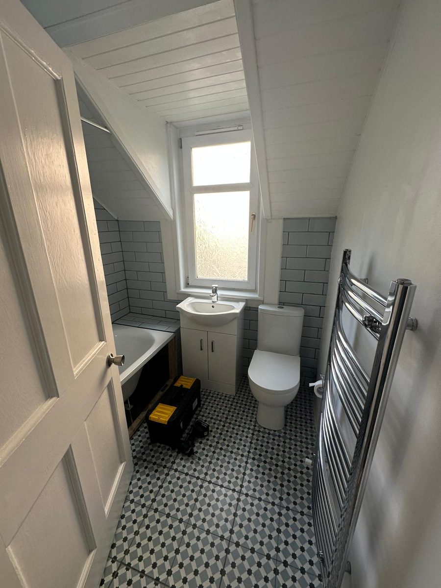 Bathroom before GPH Plumbing & Heating started