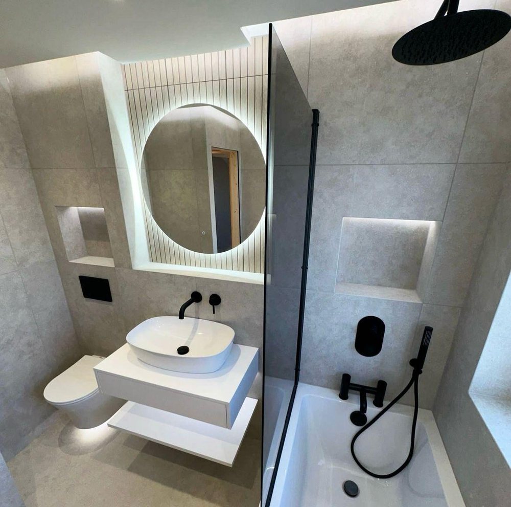 Oak panelling with a lit niche and LED mirror